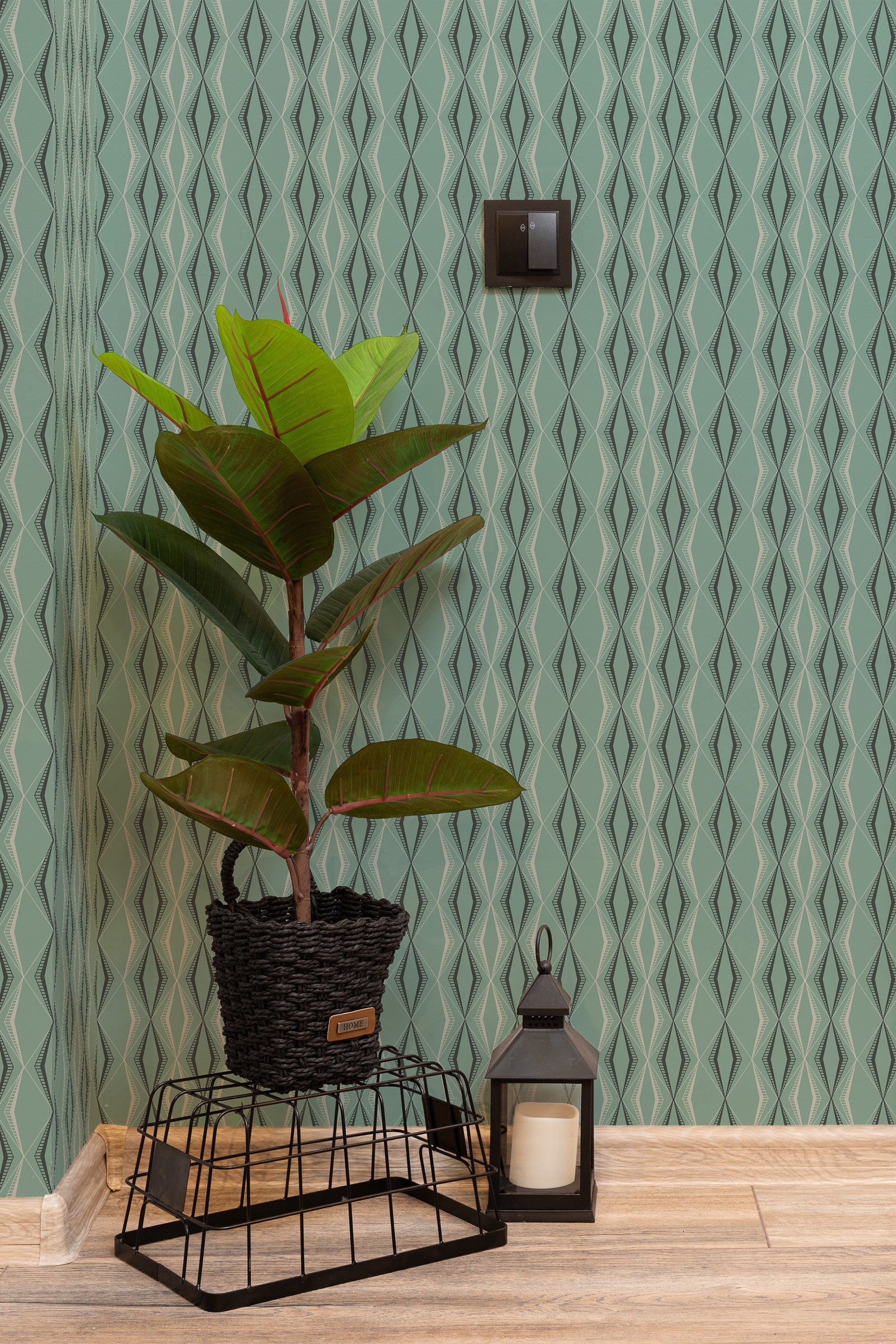 Self-adhesive Retro green wallpaper with a geometric pattern of interlocking vertical lines in varying shades of green, creating a dimensional effect. Ideal for adding a vintage touch to any room.