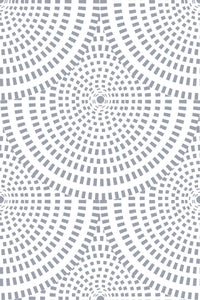Optic circle wallpaper design with repeated concentric circles of varying line thickness in shades of grey on a white background. Peel and stick removable wallpaper.