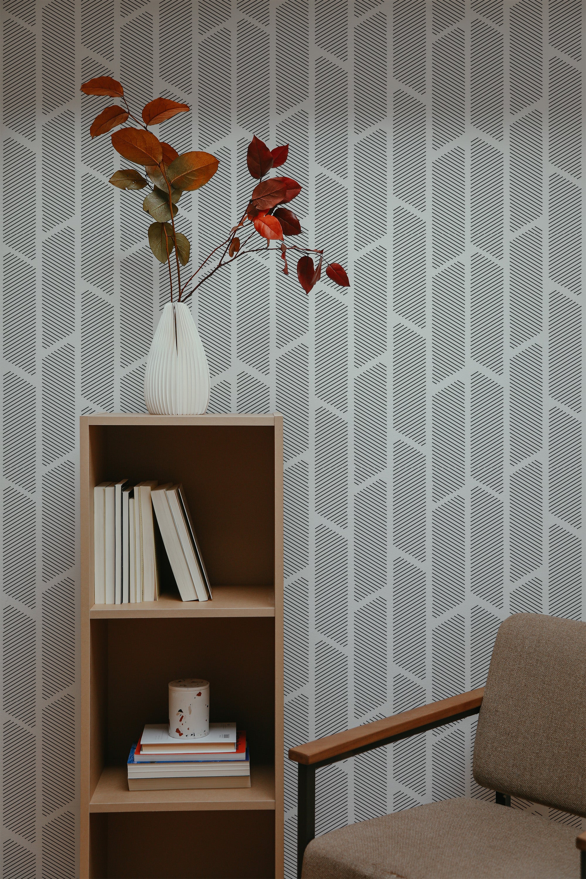 Self-adhesive geometric striped wallpaper with a pattern of interlocking vertical and diagonal lines in a subtle, neutral tone.
