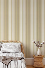 Self-adhesive Retro ethnic stripe wallpaper with vertical lines and alternating patterns in earth tones in a bedroom setting.
