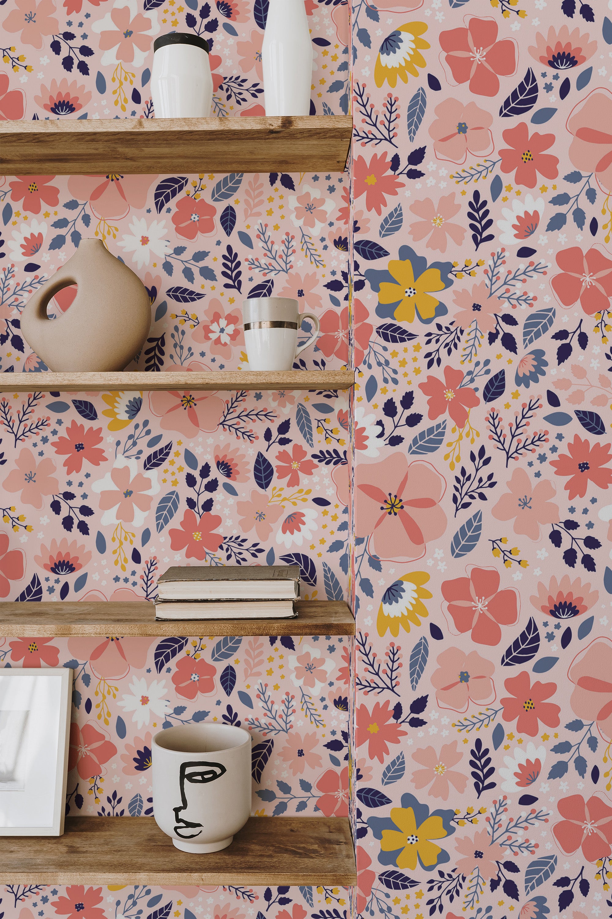 Self-adhesive pink spring wallpaper with floral pattern including blue, yellow, and pink flowers with green leaves on a shelf-lined wall.