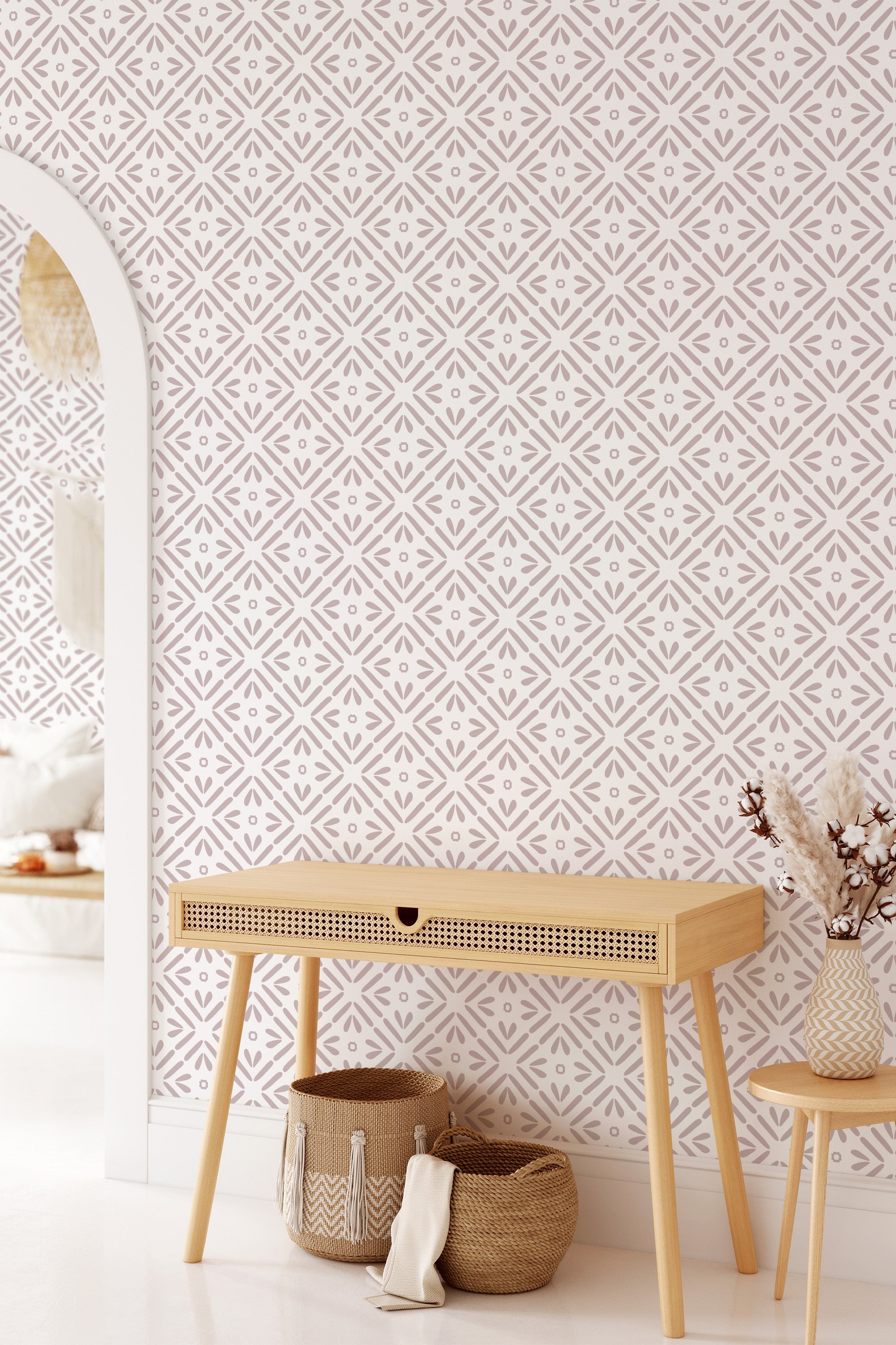 A room with geometric-patterned tile wallpaper in a neutral color scheme, complementing a modern wooden console table and wicker accents, traditional wallpaper.