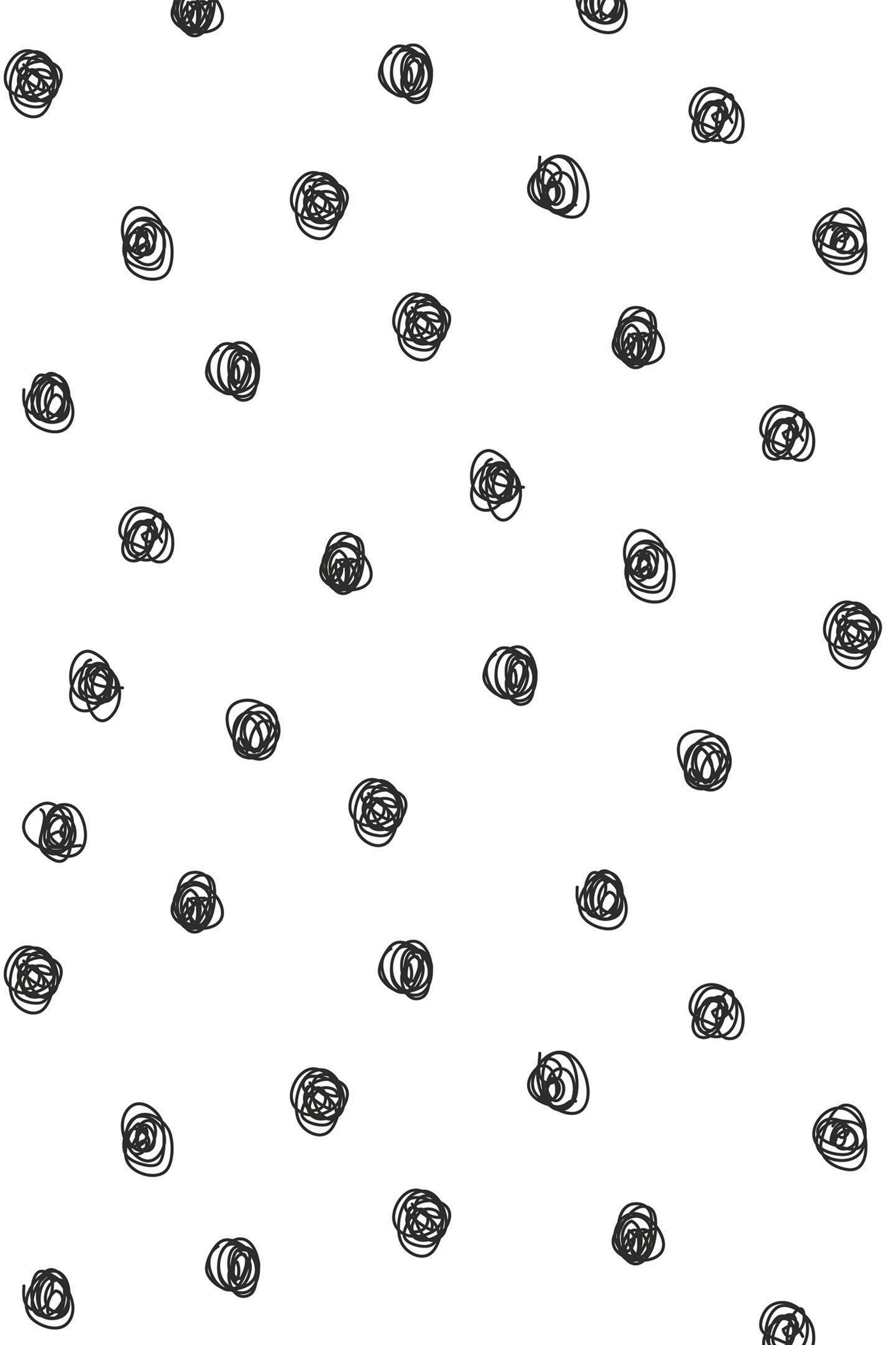 Black hand-drawn irregular dots scattered across a white background, peel and stick removable wallpaper.