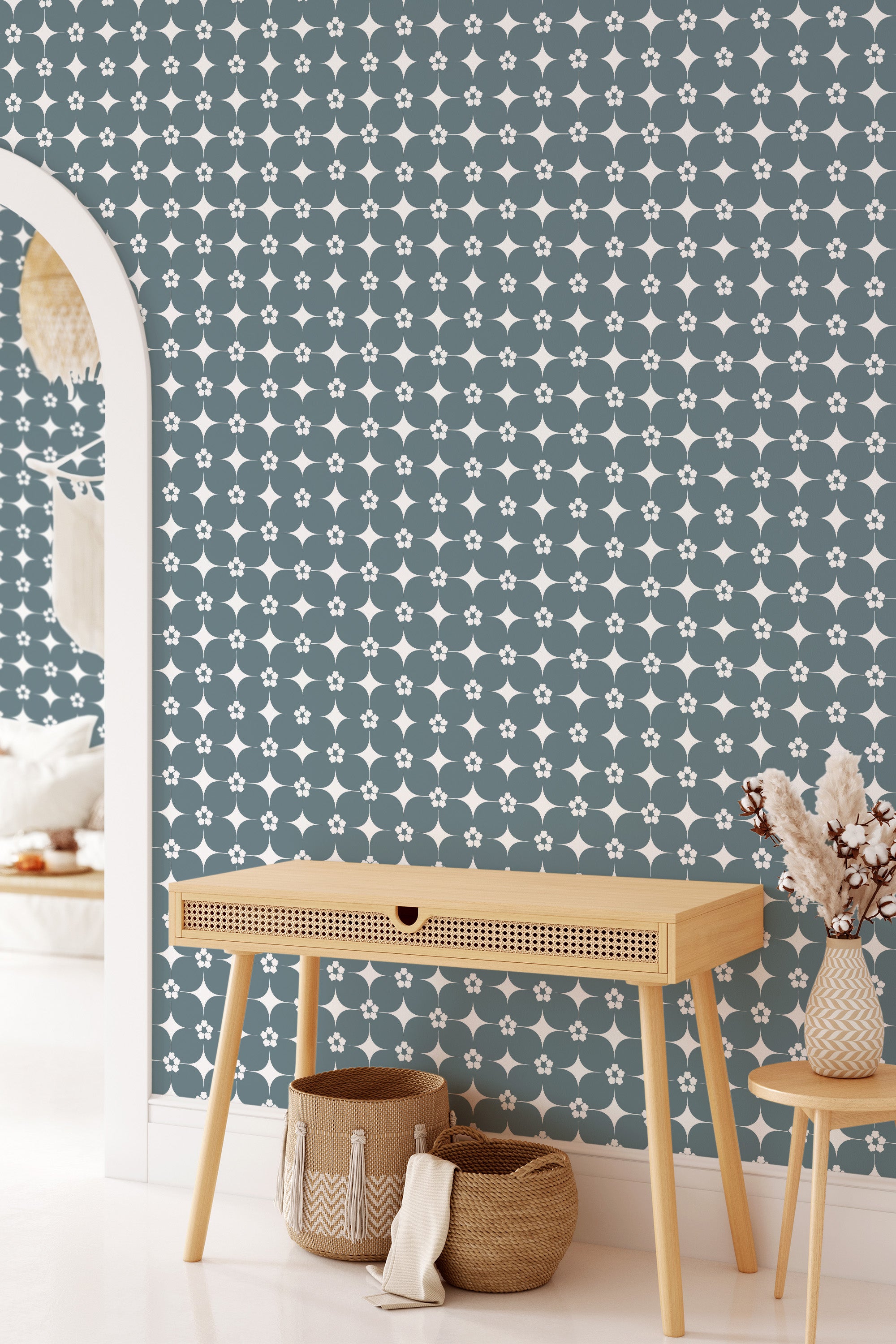 A Mid-century floral design with stylized flowers and geometric shapes on a room's wallpaper, in blue and white, classic and elegant traditional wallpaper.