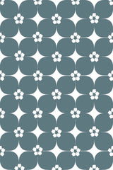 Mid-century style floral pattern with white flowers on teal scalloped background, peel and stick removable wallpaper.