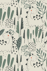 A playful pattern of white cartoon dinosaurs amid green foliage and black dots on a light background, ideal for a child's room as peel and stick removable wallpaper.
