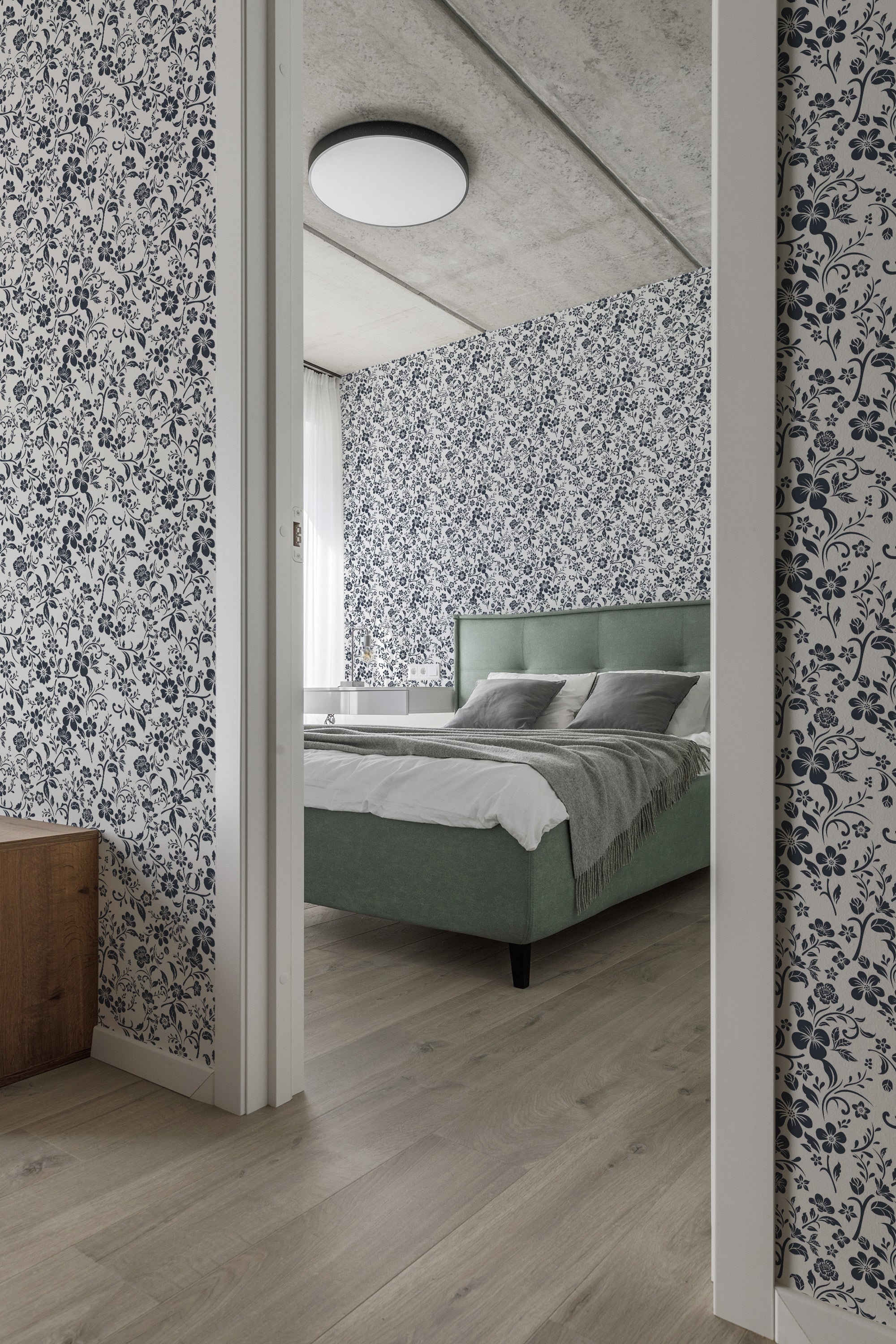 Floral-patterned wallpaper with a blue and white color scheme, enhancing the room's cozy ambiance. The design reflects a retro farmhouse aesthetic, evoking a timeless charm and comfort. Traditional wallpaper.