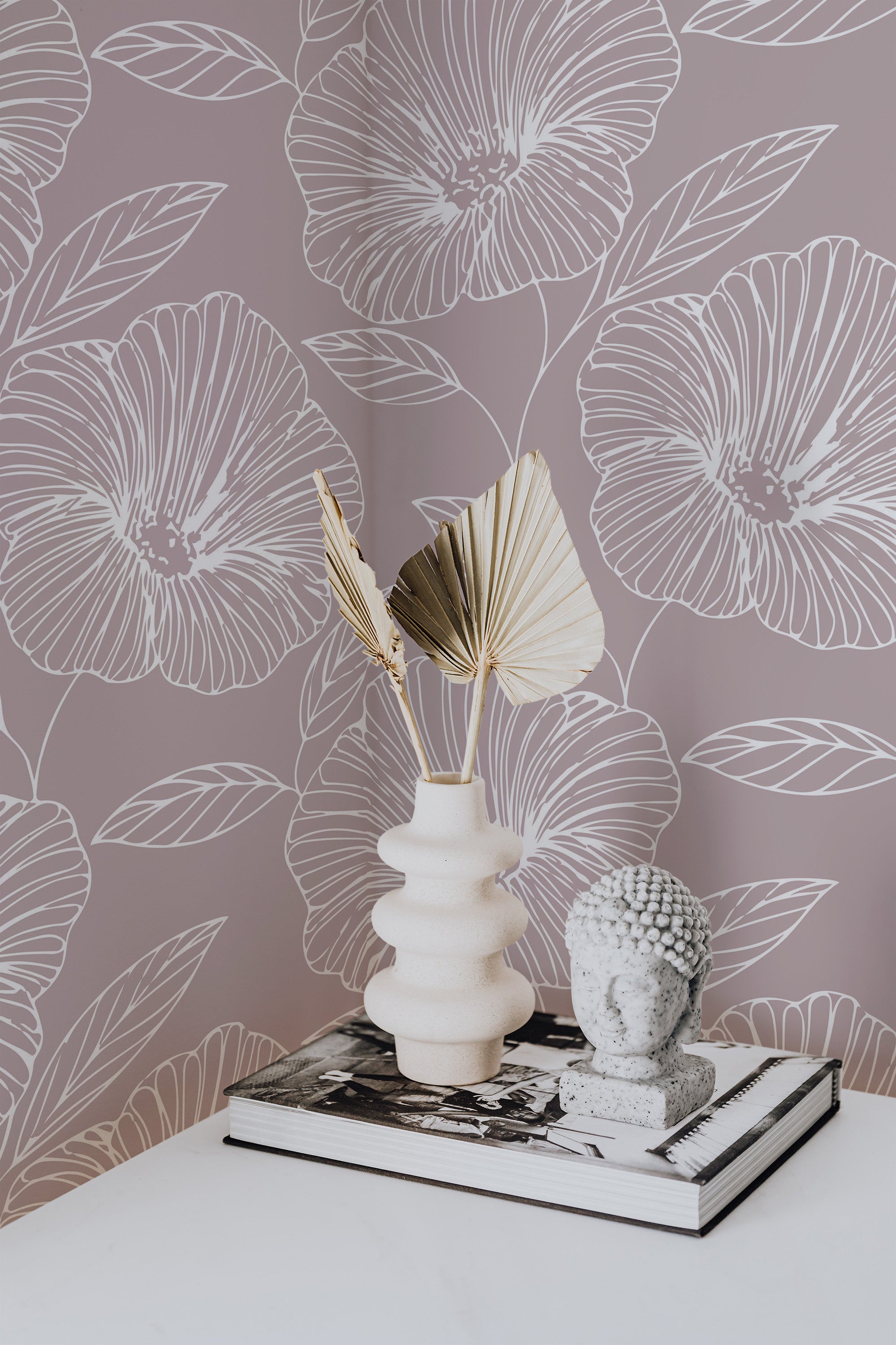 Self-adhesive wallpaper in a soft mauve hue with delicate white floral line art depicting large flowers and leaves, enhancing the room���s aesthetic with a minimalistic and modern touch.