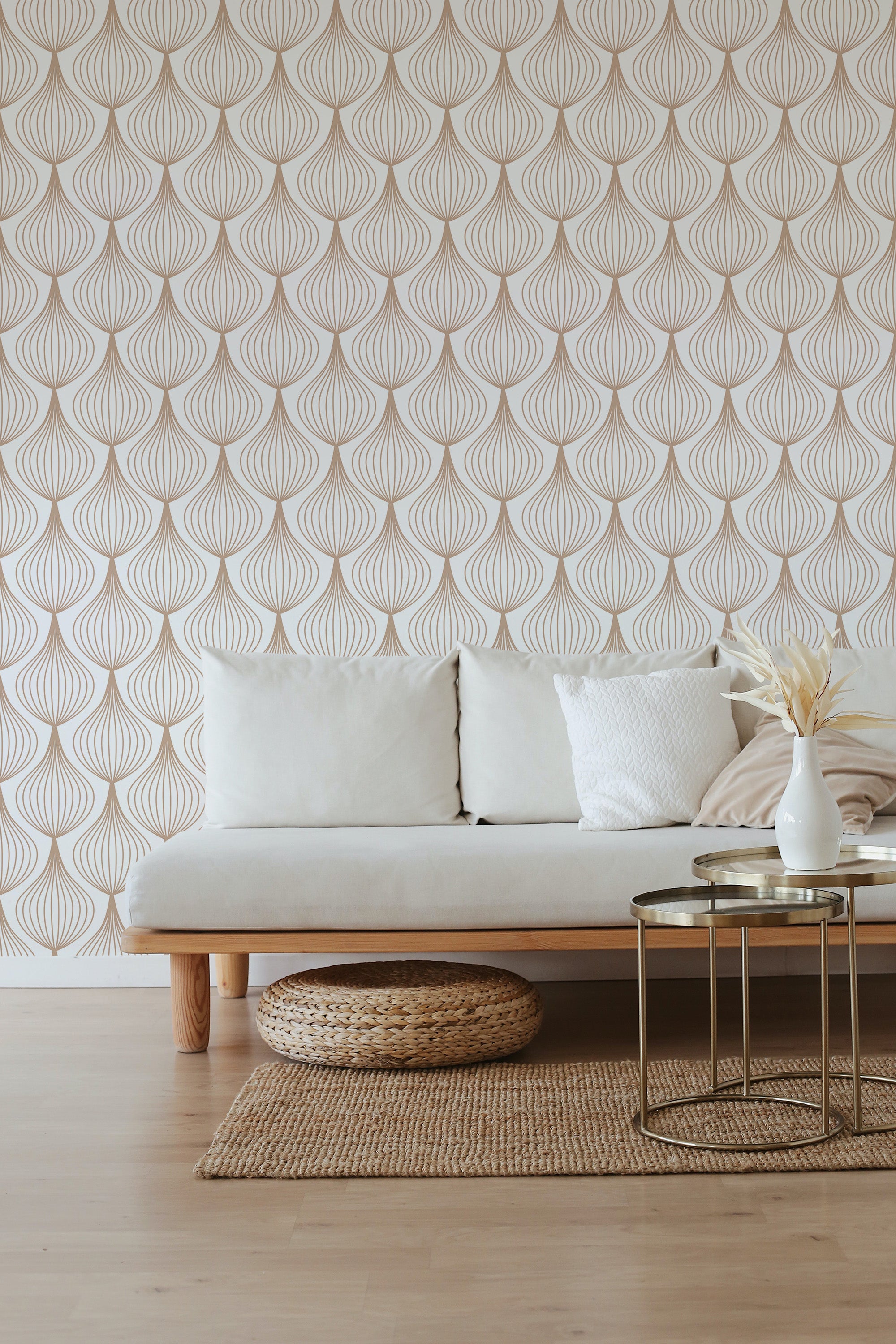A room interior with a light-colored Art Deco line art wallpaper pattern showing curved lines forming elegant fan shapes in a repetitive geometric style. The wallpaper complements the minimalistic and cozy room decor, blending modern design elements with the warmth of traditional wallpaper.