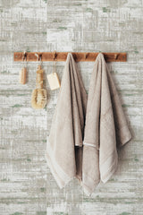 Self-adhesive retro texture wallpaper with a distressed, layered pattern combining muted greens, greys, and white, evoking a vintage, worn-in effect.