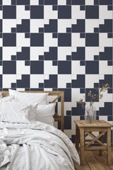 Self-adhesive wallpaper with a modern geometric design, featuring a black and white checkered pattern with alternating squares and overlapping rectangles. Ideal for adding a contemporary touch to any room.
