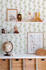 Self-adhesive wallpaper with a delicate Leaf String design, featuring small green leaves connected by thin stems on a light background, creating an elegant and natural aesthetic in the room.