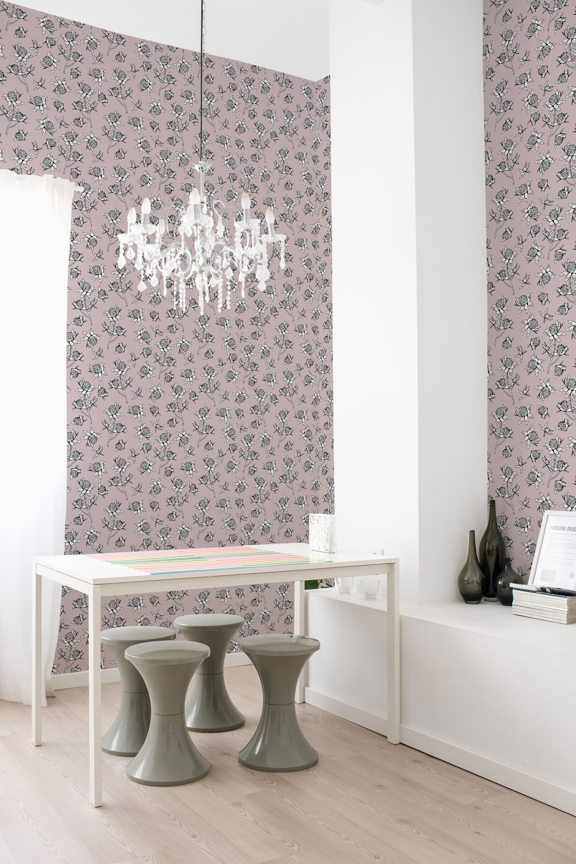 The wallpaper design, named Floral Line, depicts delicate black and white floral patterns on a soft pink background, giving the room a classic and elegant look. Traditional wallpaper.
