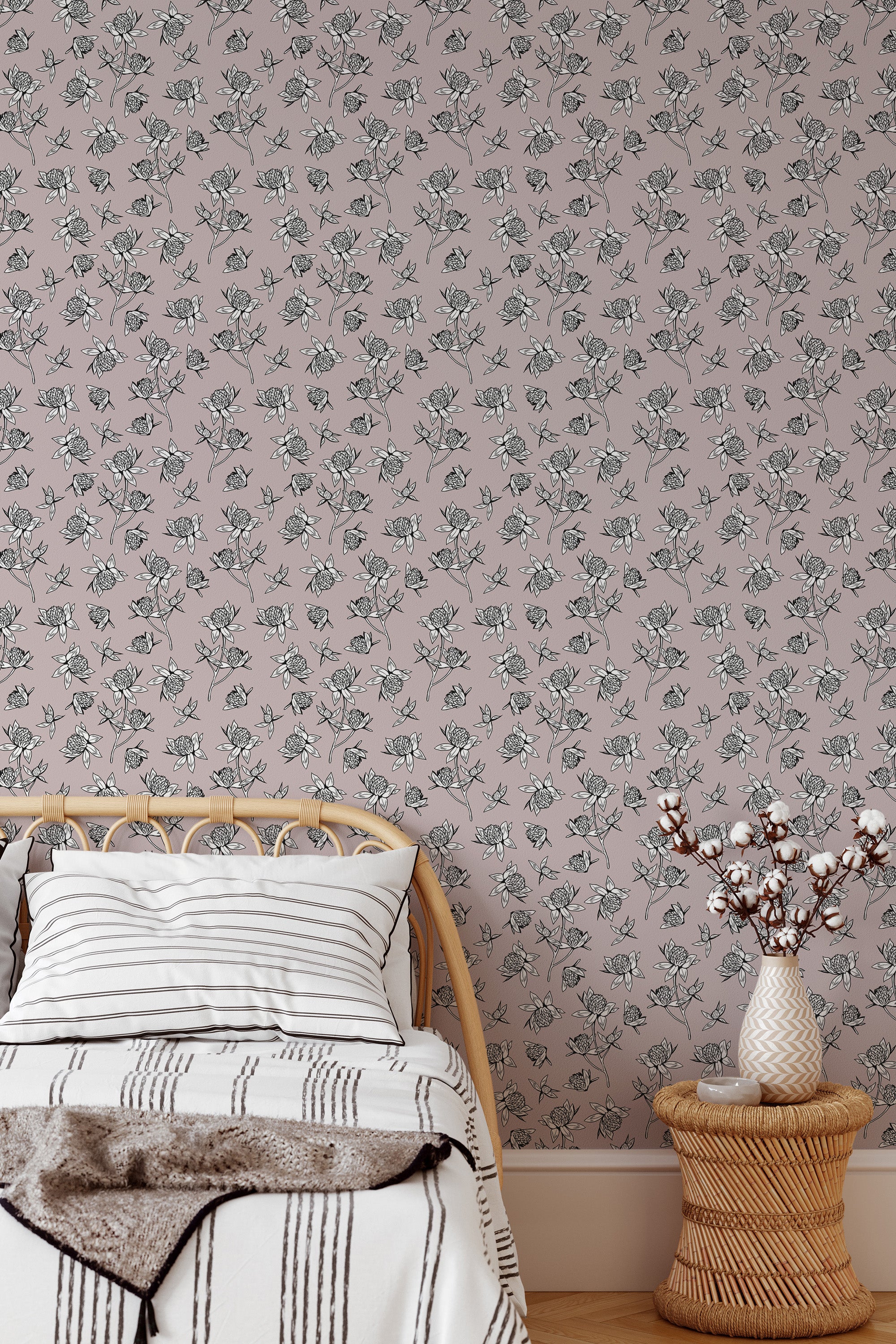 Self-adhesive wallpaper with a delicate floral line design featuring detailed, monochrome flowers and vines on a muted, pastel-colored background.
