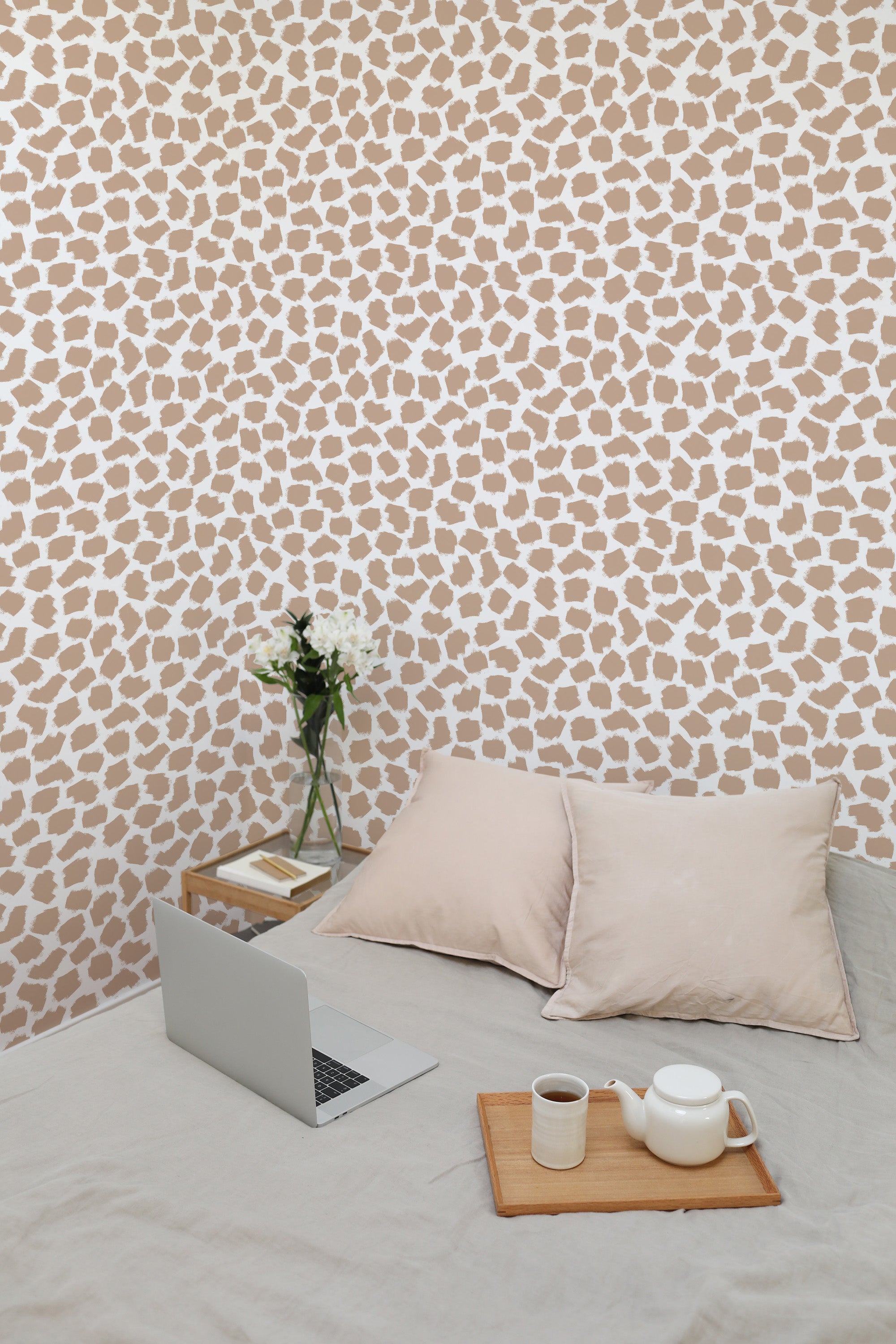 Self-adhesive wallpaper with a painted dots design in beige and white, creating an abstract, irregular dotted pattern.