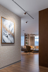 Wallpaper with an organic pattern of small, irregularly shaped dots in a soft, natural tone, giving the wall a textured, sophisticated look,raditional wallpaper.