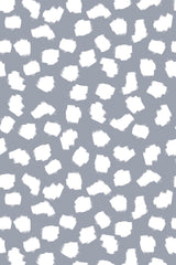 Gray background with irregular white brushstroke dots scattered evenly throughout, creating a playful and modern pattern. Peel and stick removable wallpaper.