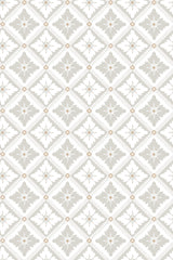 A seamless pattern of neutral-toned vintage tiles with geometric shapes and intricate details. The design includes diamond shapes and stylized floral accents in soft gray and beige tones. Peel and stick removable wallpaper.
