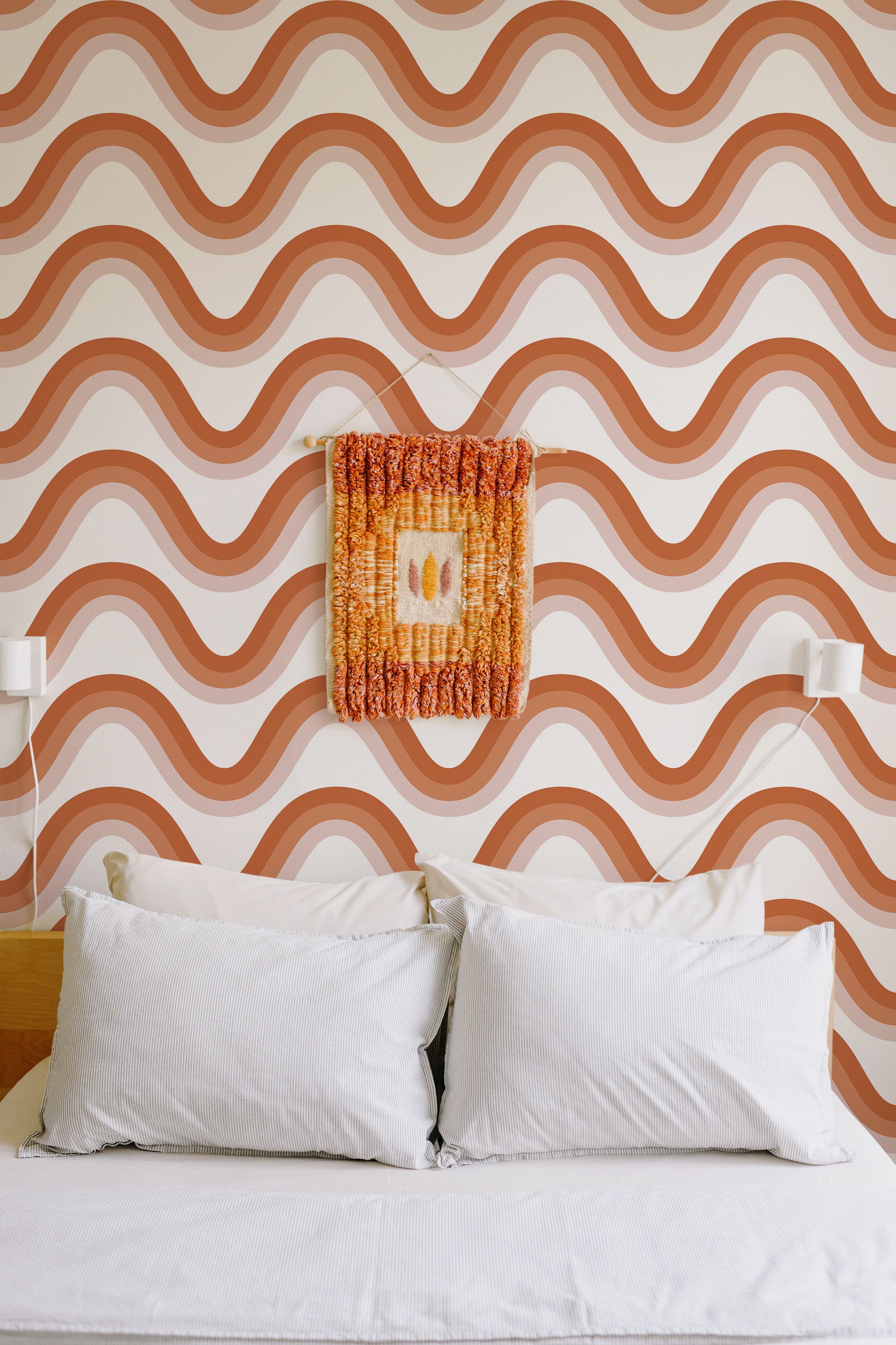 Self-adhesive wallpaper with a Boho line design, displaying wavy geometric patterns in warm earthy tones of orange and beige on a light background.