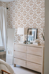 Victorian ornamental wallpaper with a repeating pattern of intricate floral motifs in a soft, muted brown shade on a light background, creating an elegant and timeless look. Traditional wallpaper.