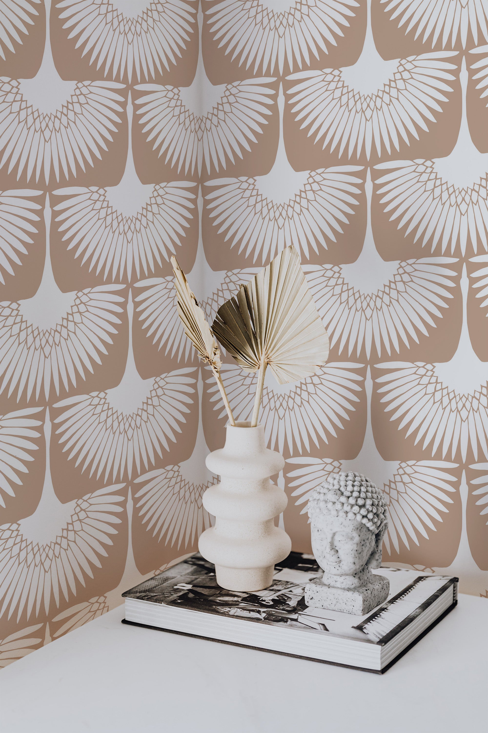 Self-adhesive wallpaper with a symmetrical pattern of swan wings in a neutral beige and white color palette, creating an elegant and modern look.