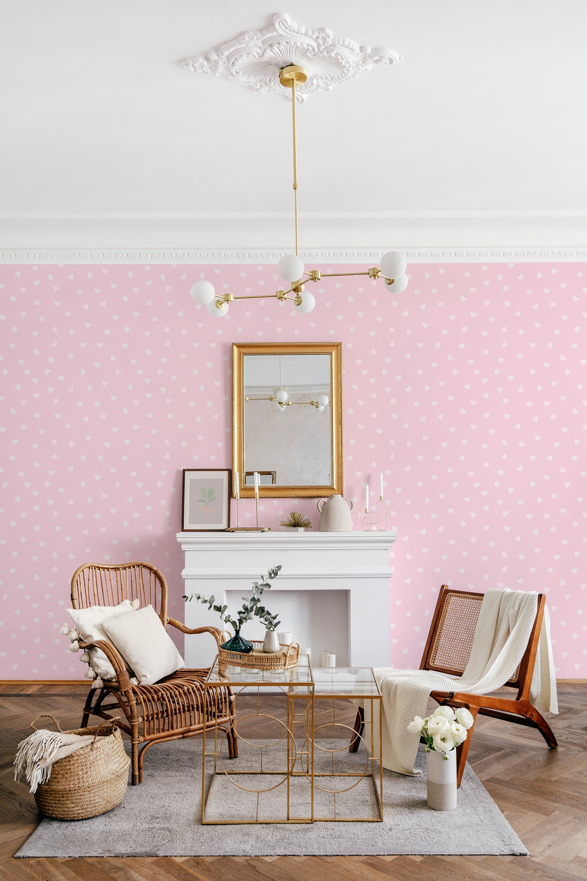 Pink wallpaper with a repeating pattern of small white hearts, creating a soft and charming ambiance in the room. Traditional wallpaper.