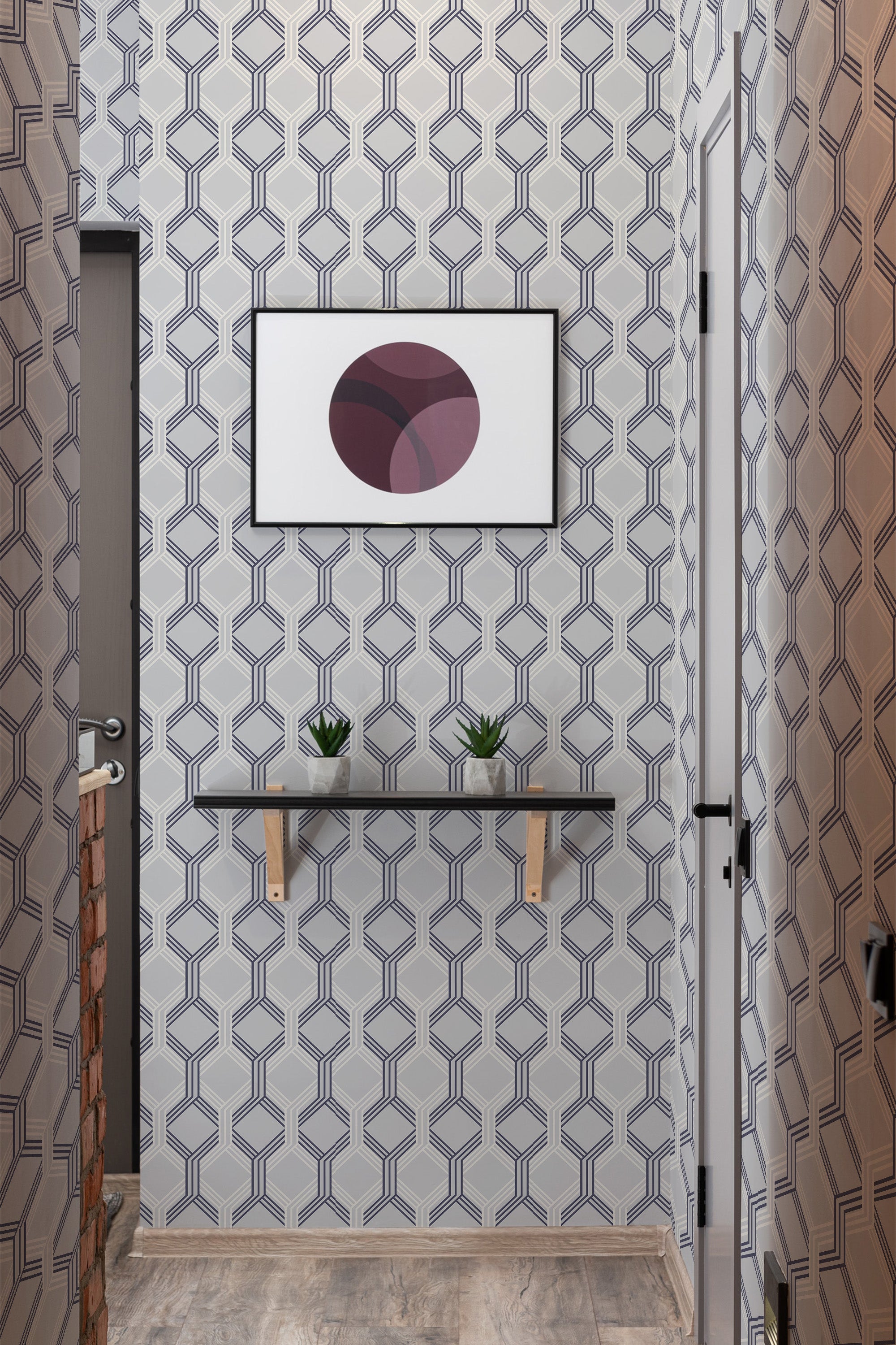 Geometric wallpaper with intricate hexagonal pattern in subtle shades of grey and white, creating a repetitive, symmetric design for a classic, traditional wallpaper.