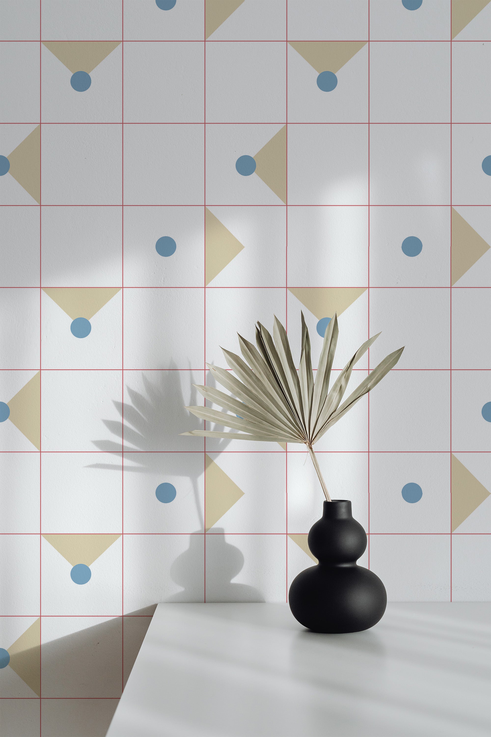 Self-adhesive minimal geometric wallpaper with a grid pattern of thin pink lines, featuring yellow triangles and blue circles.