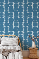 Self-adhesive wallpaper with a blue retro shape design, featuring rounded geometric patterns in varying shades of blue against a light background.