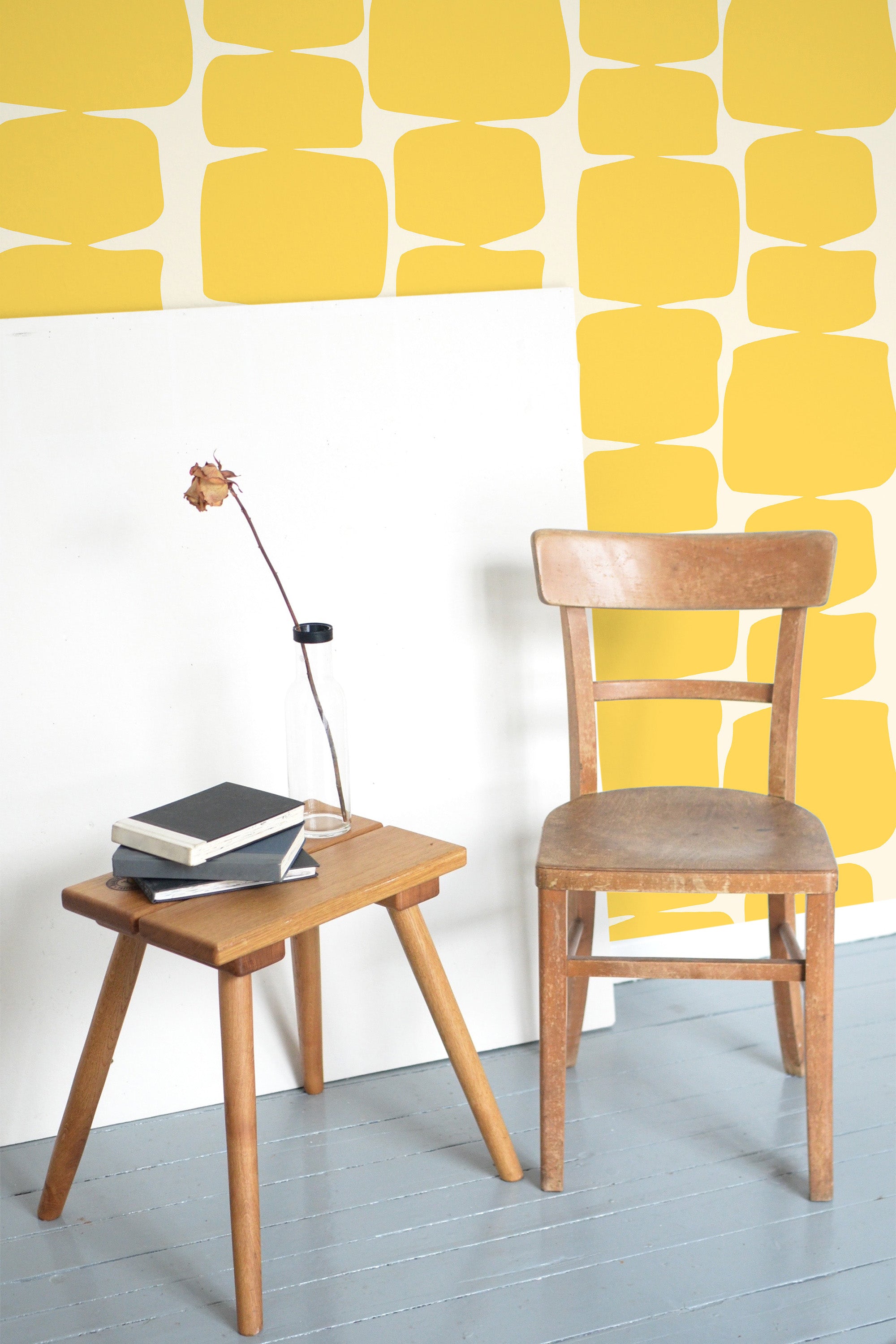 Self-adhesive wallpaper with a yellow retro shape design, featuring large rounded yellow blocks on a light background. The bold, geometric pattern adds a vintage and playful vibe to the room.