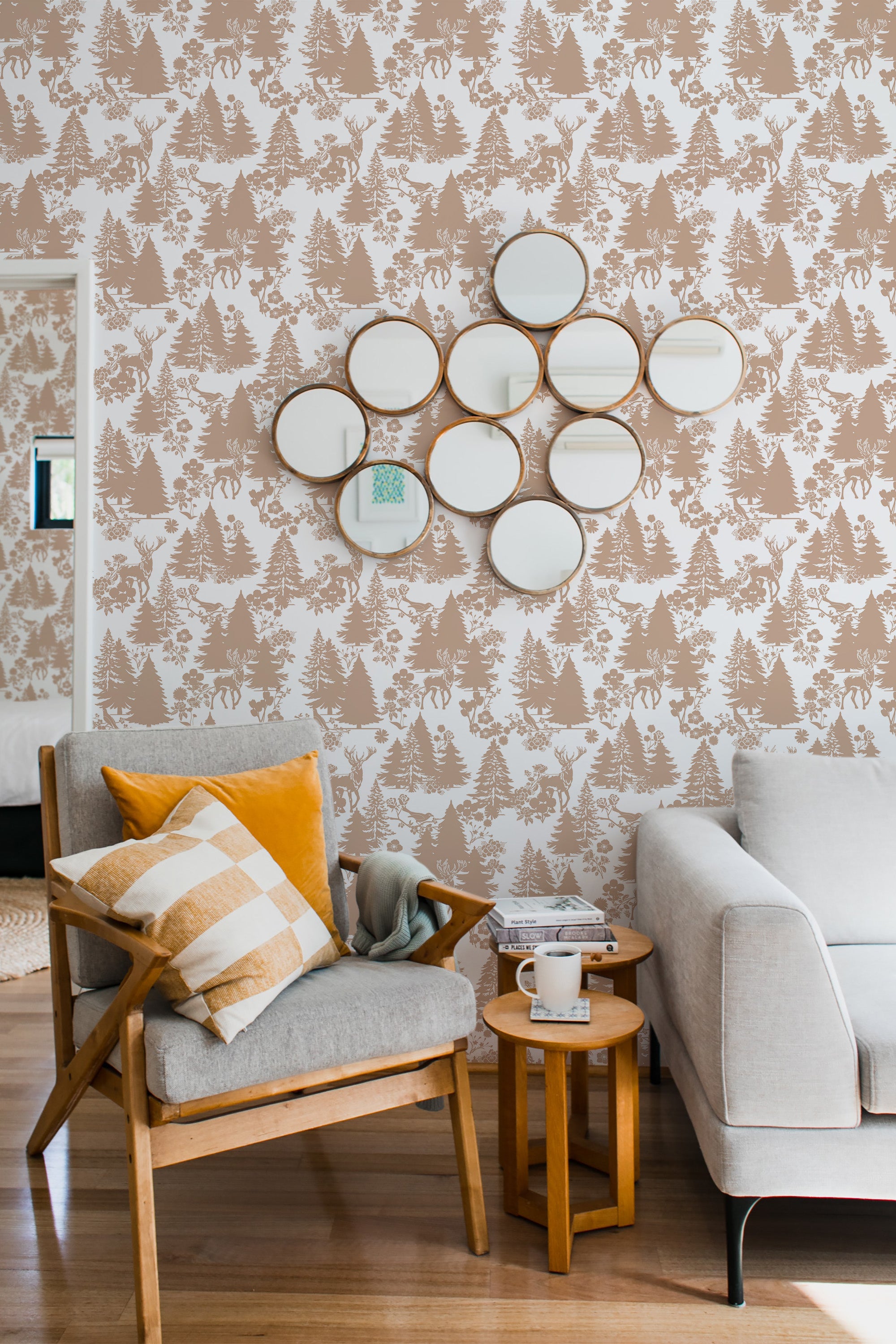 Beige and white wallpaper with a detailed forest pattern of trees, covering the wall in a room with modern furniture. Traditional wallpaper.