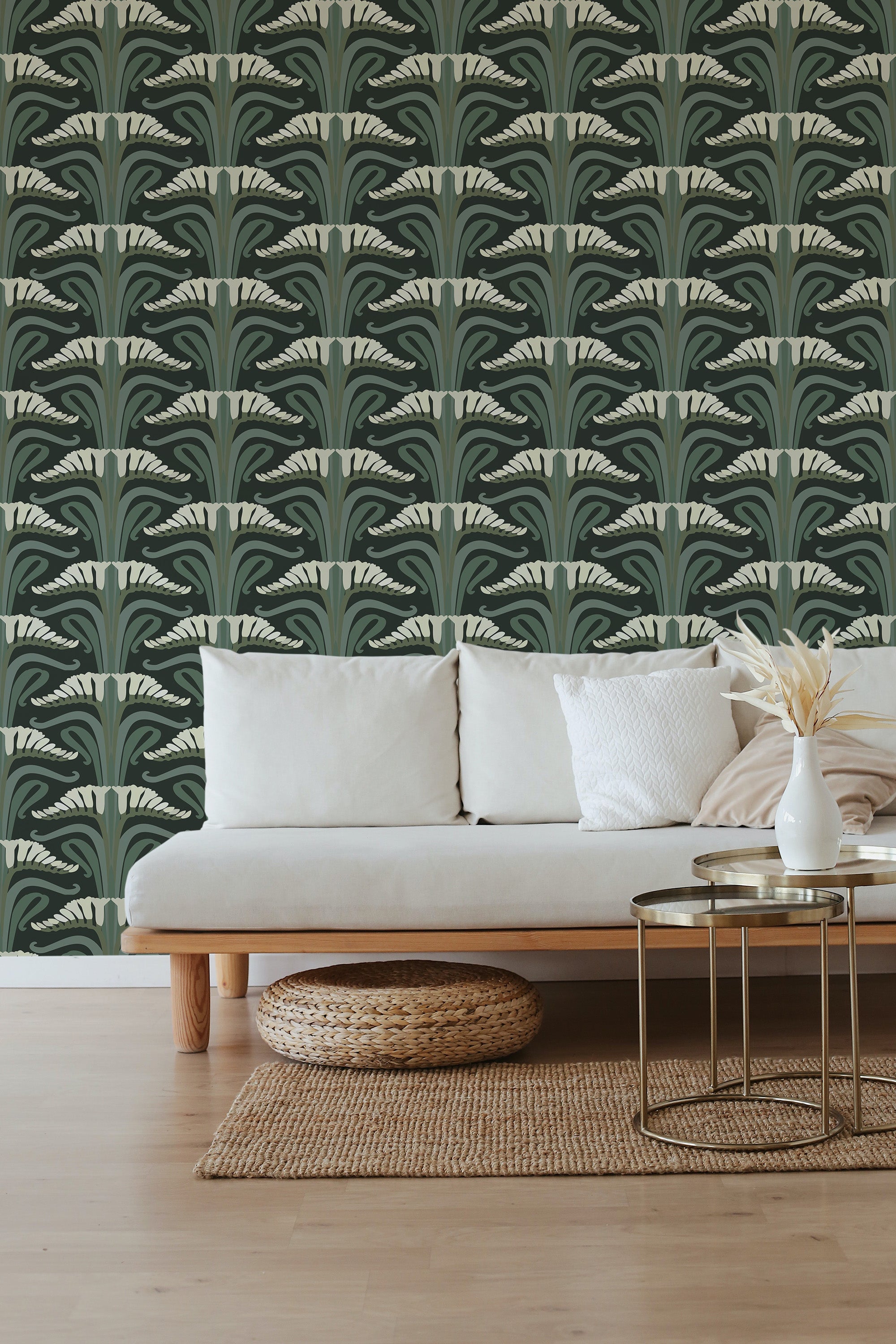 Wallpaper with an Art Nouveau design in shades of green and cream, forming repeating stylized floral patterns with elegant, flowing curves and geometric symmetry. The pattern evokes a sense of nature-inspired beauty with an ornate and decorative touch, adding a classic and sophisticated ambiance to the room. This is traditional wallpaper.