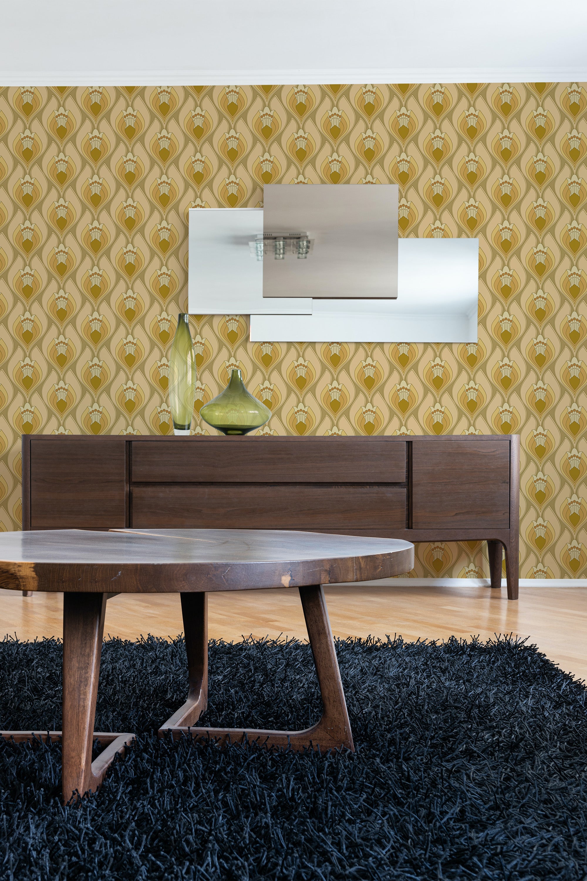 Yellow retro floral wallpaper with a repeating pattern of stylized yellow flowers and green leaves against a light mustard background, creating a vintage look reminiscent of mid-century design. Traditional wallpaper.