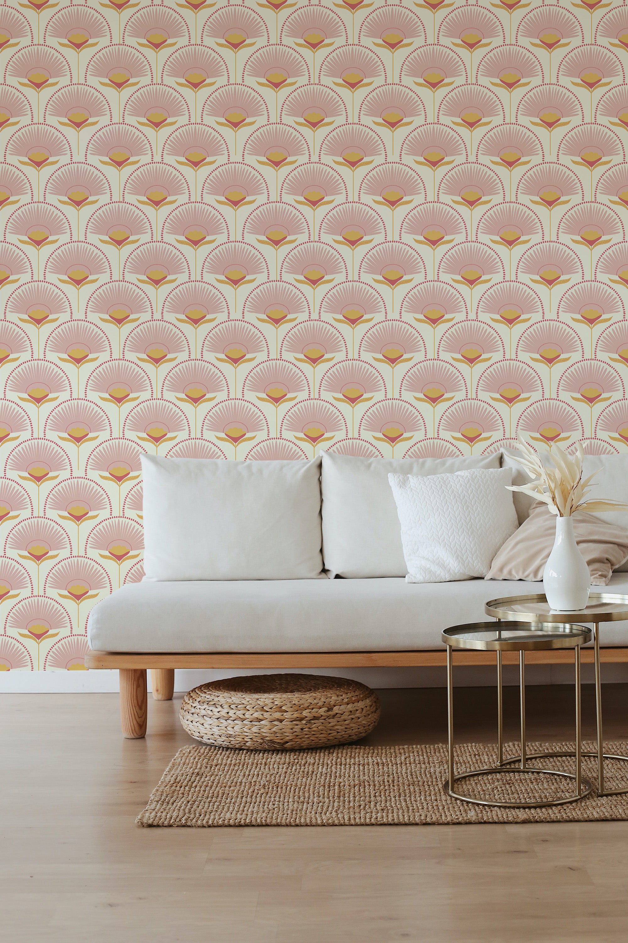 Retro floral wallpaper with a pattern of stylized fan-shaped flowers in soft pink and yellow tones, creating a nostalgic and warm atmosphere in the room. Traditional wallpaper.