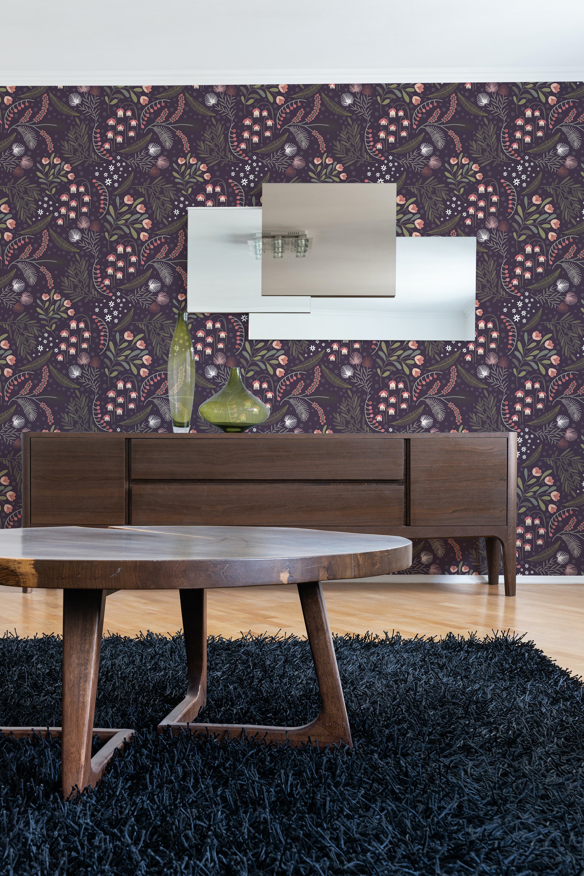 Dark floral garden wallpaper with rich, deep hues of purple, pink, and green forms intricate patterns of blooming flowers, leaves, and vines on a dark textured background, adding elegance and depth to the room. Traditional wallpaper.