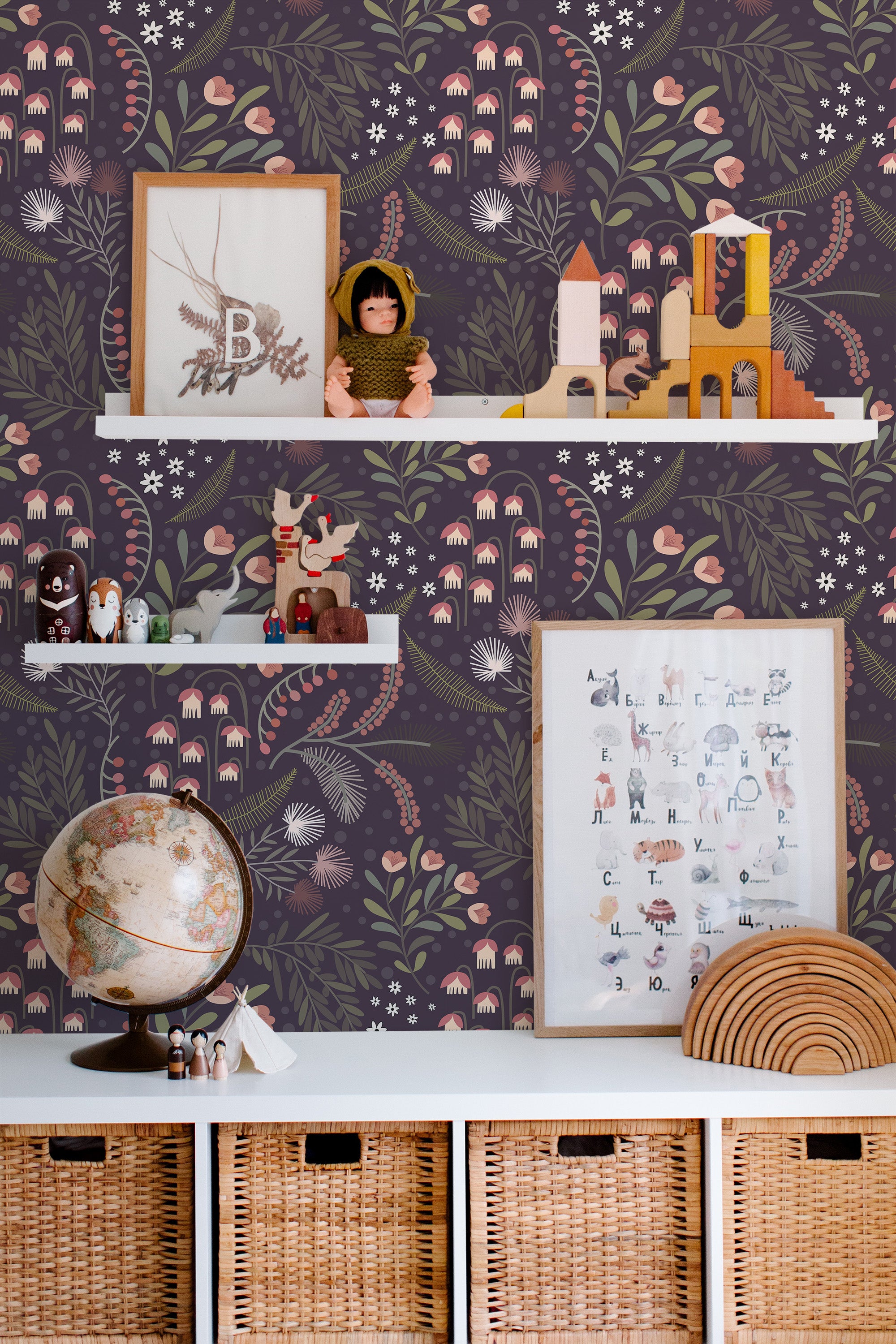 Self-adhesive wallpaper with a dark floral garden design, featuring delicate pink and white flowers surrounded by lush green leaves on a deep, muted background.
