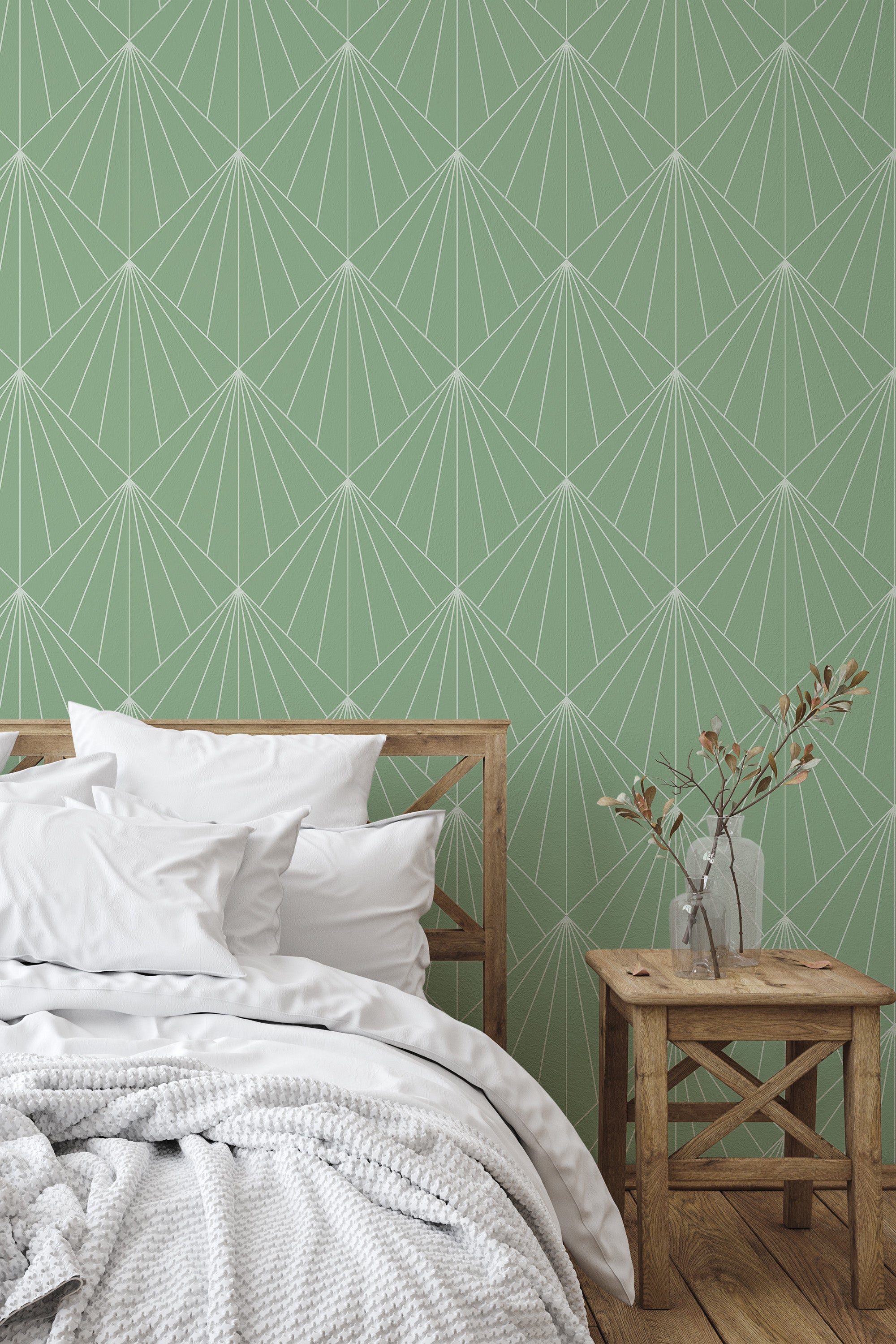 Self-adhesive wallpaper with a bold Art Deco design characterized by geometric fan-shaped patterns in white over a muted green background.