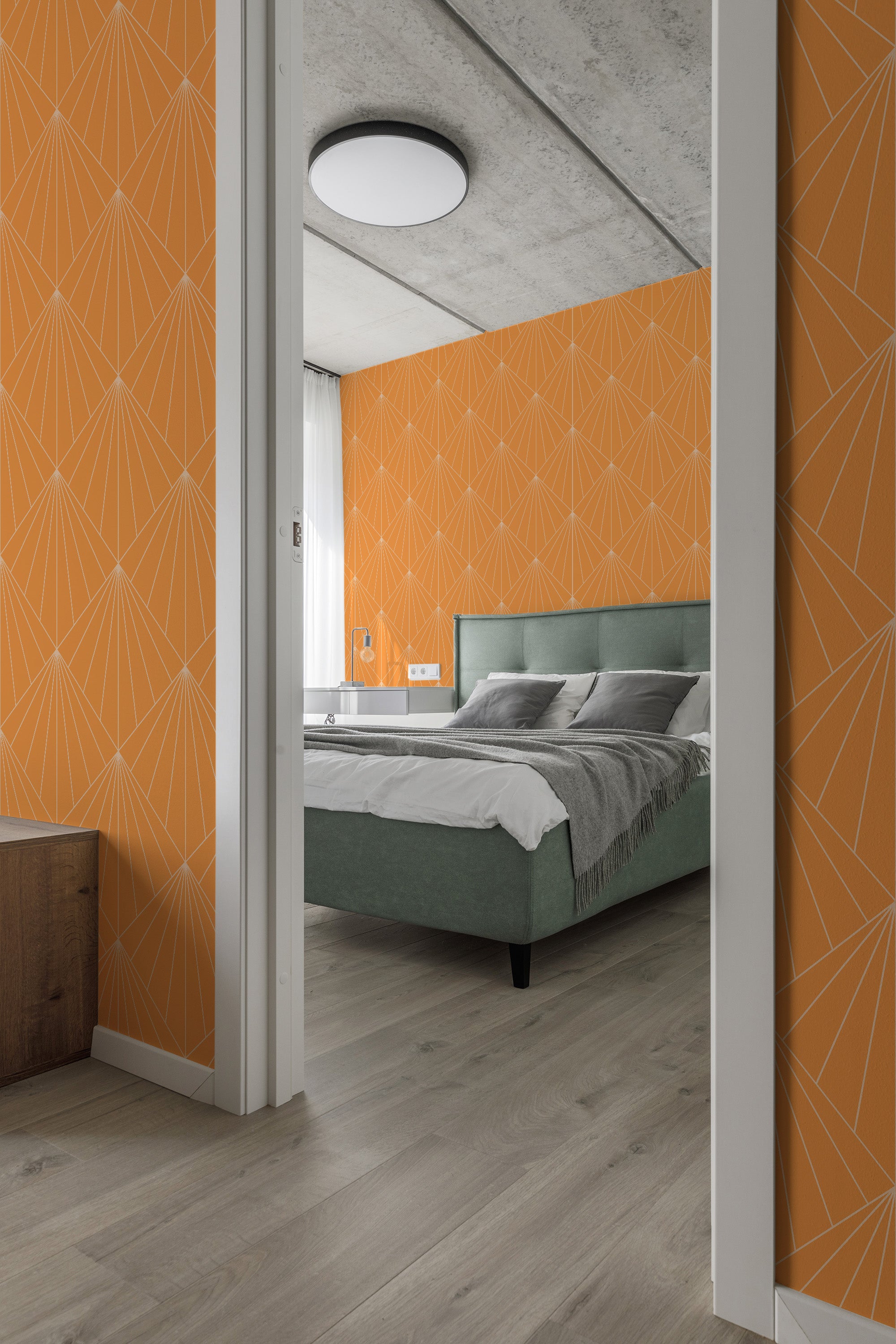Orange wallpaper with white geometric lines arranged to create a pattern that resembles sun rays on the wall in a bedroom. Traditional wallpaper.
