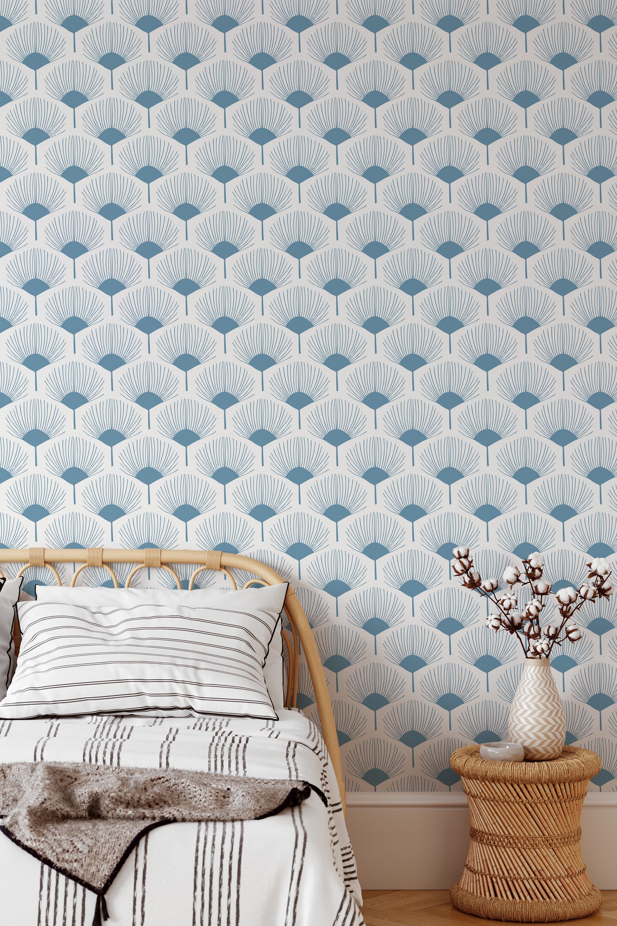 Self-adhesive wallpaper with a pattern of stylized abstract leaves in blue and cream tones, arranged in a repeating geometric pattern.