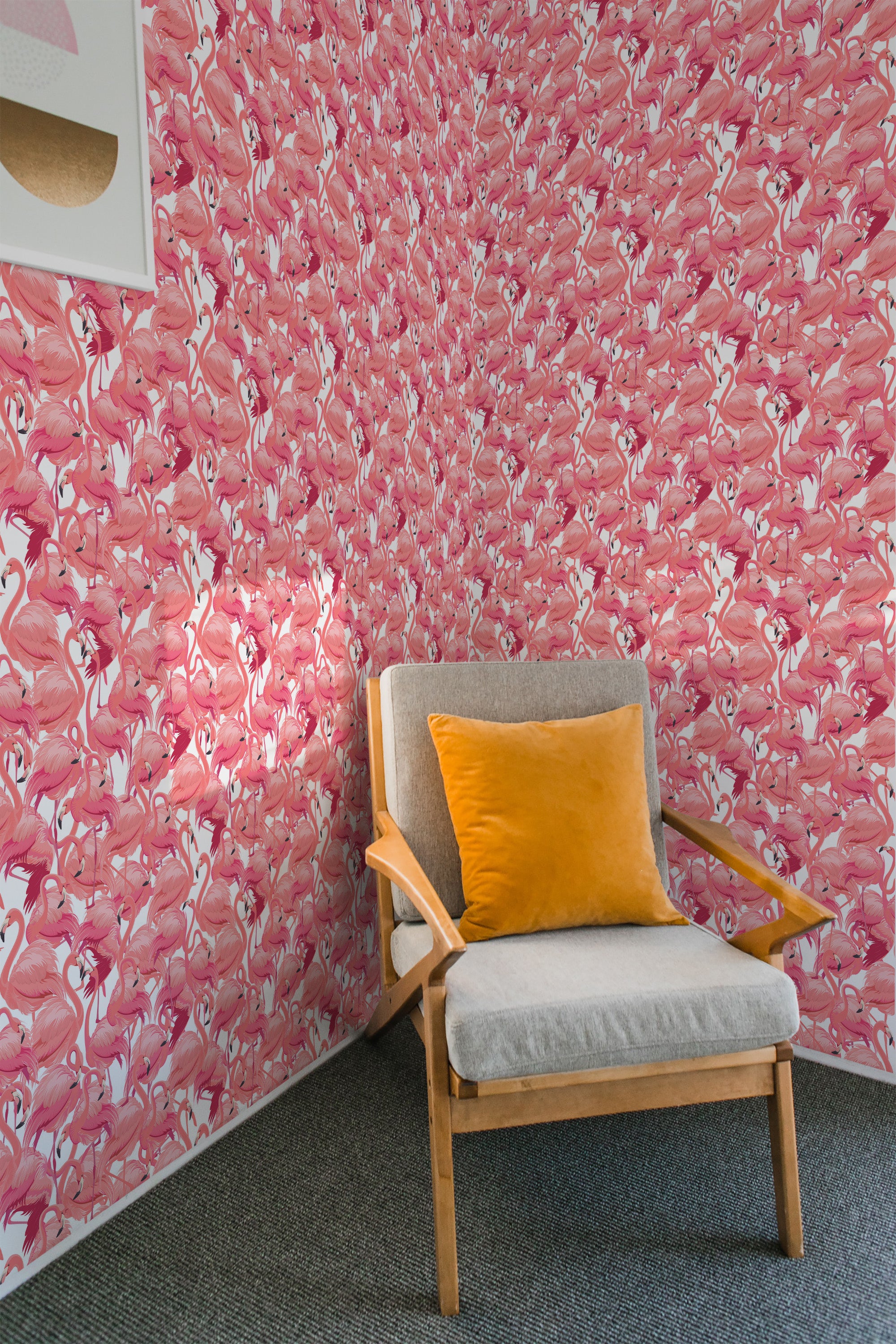 Wallpaper with a vibrant pattern of pink flamingos standing among tropical foliage, creating a lively and playful atmosphere. This design is presented in a repeat pattern, giving the entire wall a cohesive and uniform look. Traditional wallpaper.