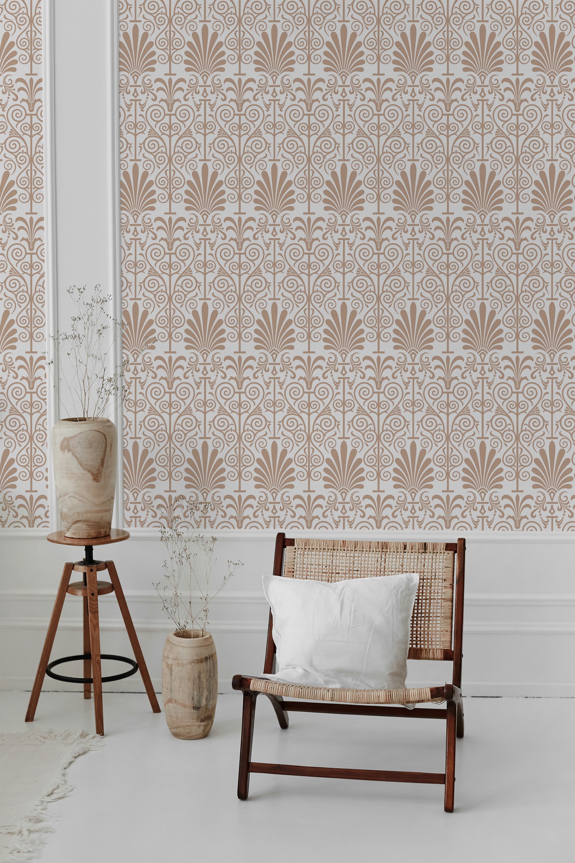 Room with elegant Damask wallpaper pattern in soft beige tones, creating a symmetrical design of intricate floral and scroll motifs against a white background. The space also includes a wooden chair with a white cushion and decorative vases, adding to the timeless and classic atmosphere. Traditional wallpaper.