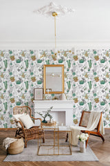 Wallpaper with a repeating pattern of intricately illustrated green cacti, brown plants, and grey floral elements on a light background, creating a natural and serene atmosphere. Finished with traditional wallpaper.