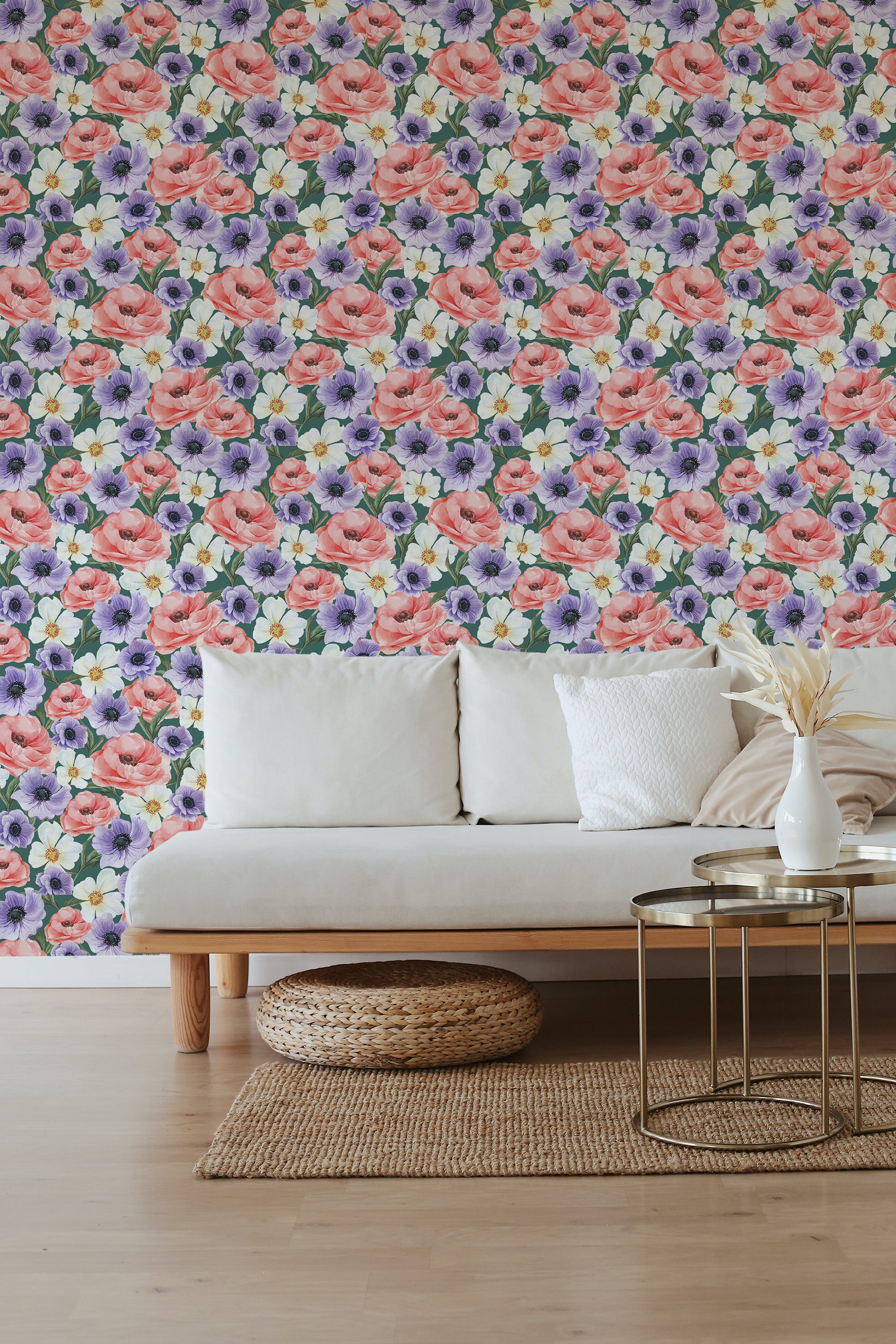 Floral wallpaper in vibrant colors with pink roses, purple anemones, and green foliage pattern, creating a lively and inviting ambiance in the room. Traditional wallpaper.
