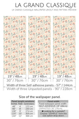 Pastel pink floral wallpaper with delicate, softly colored flowers and green leaves arranged in a lush, vintage-inspired pattern, lending a warm and inviting feel to the room. Traditional wallpaper.