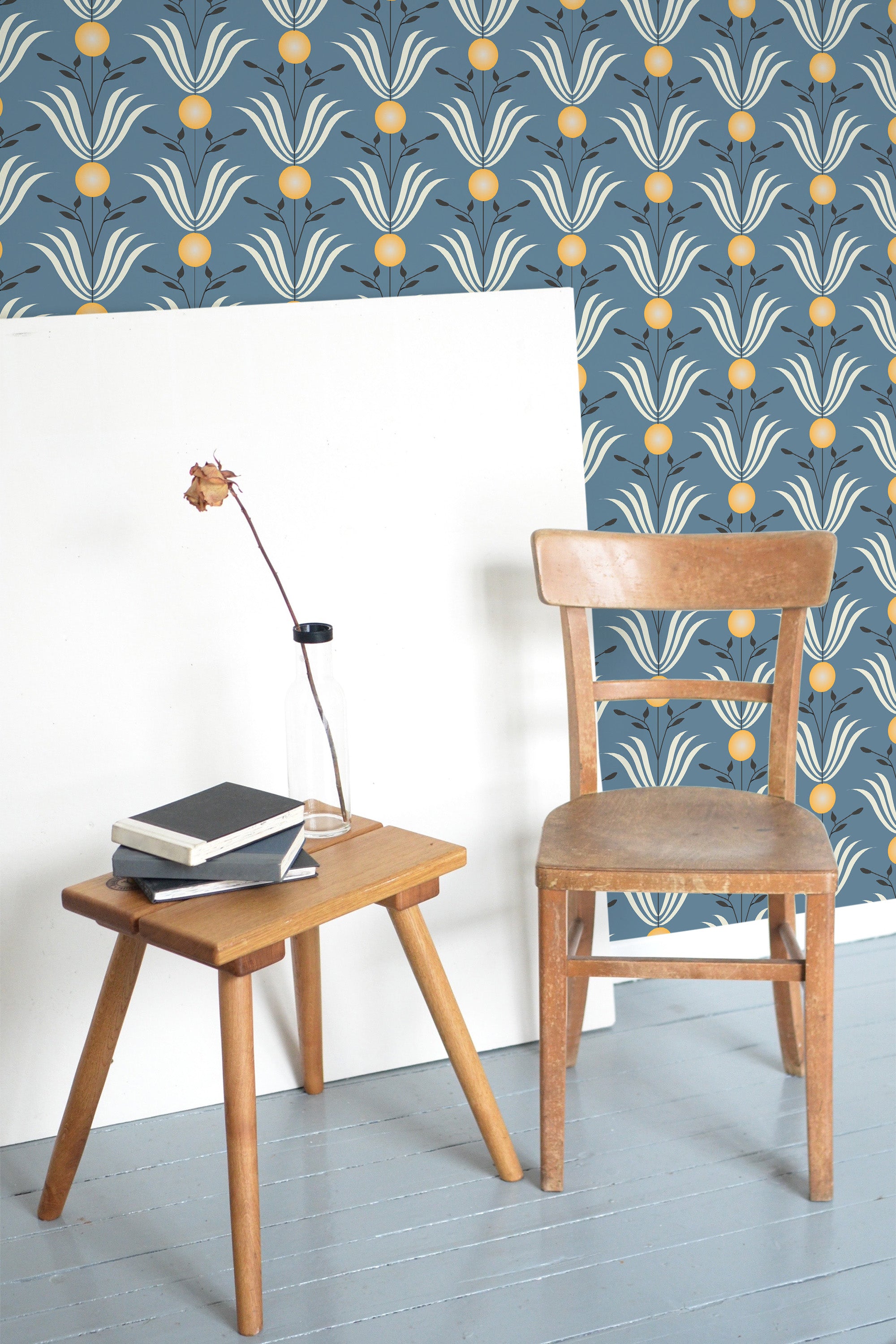 Self-adhesive blue art deco leaf wallpaper with a stylized leaf pattern in white and gold accents.