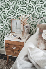 Self-adhesive green art deco paisley wallpaper with an elegant, symmetrical pattern.