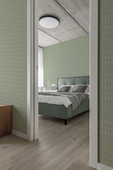 Sage green wallpaper with delicate vertical brush stroke patterns in a soft, muted tone. Traditional wallpaper.