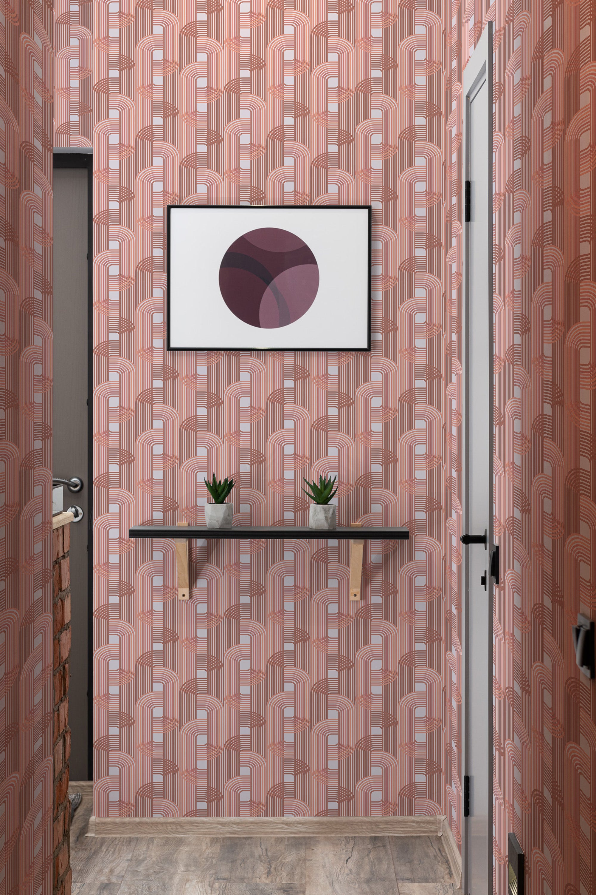 The wallpaper design includes repetitive pink arches with intricate patterns and a blend of pale and dark shades, creating a harmonious geometric aesthetic. Traditional wallpaper.