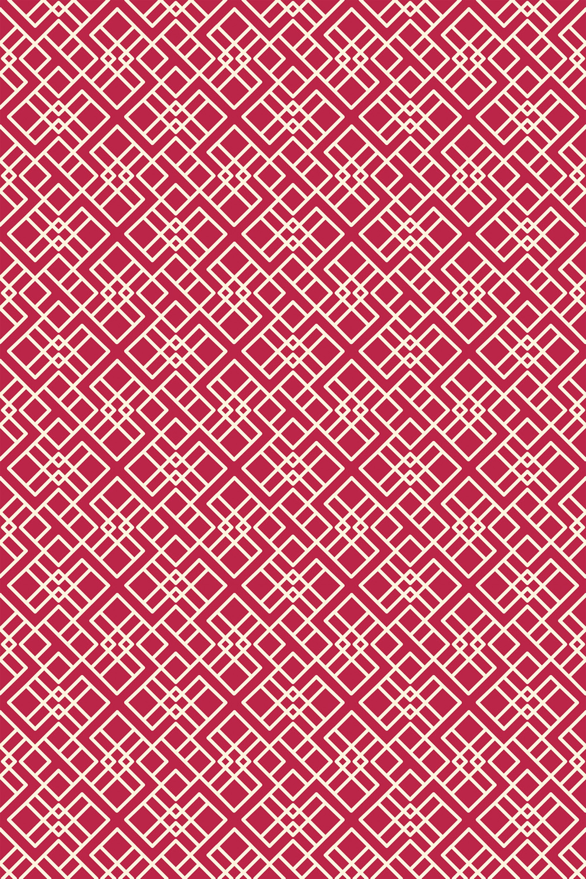 A repeating geometric pattern with white, intricate, interlocking shapes against a bold Viva magenta background. Peel and stick removable wallpaper.
