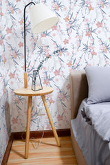Self-adhesive watercolor flower wallpaper with soft pink blossoms and green leaves on a white background, adding a delicate and fresh ambiance to the room.